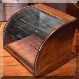 D27. Glass and wood display cabinet 